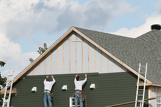 Professional Siding Replacement technician working in Woodland, WA